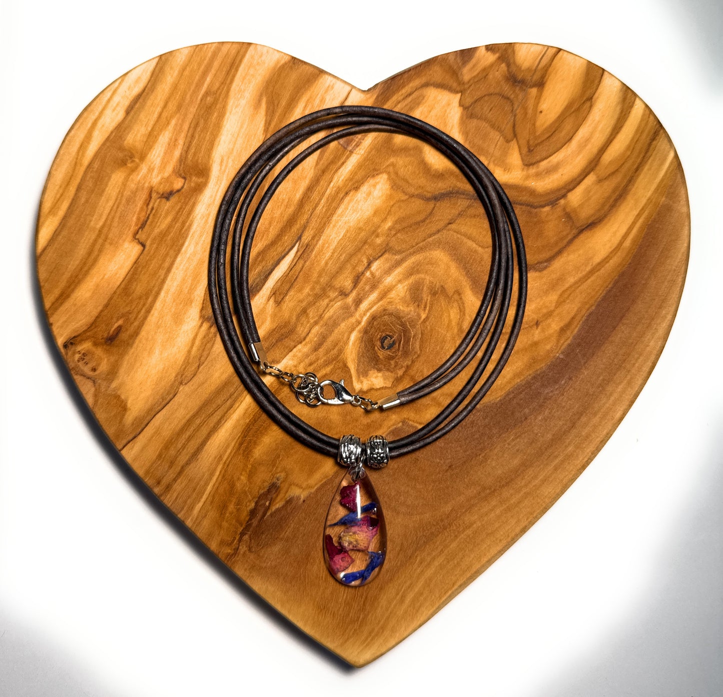 Resin Pendant with Blue Cornflower and Red Rose Petals on Dual Leather Cords