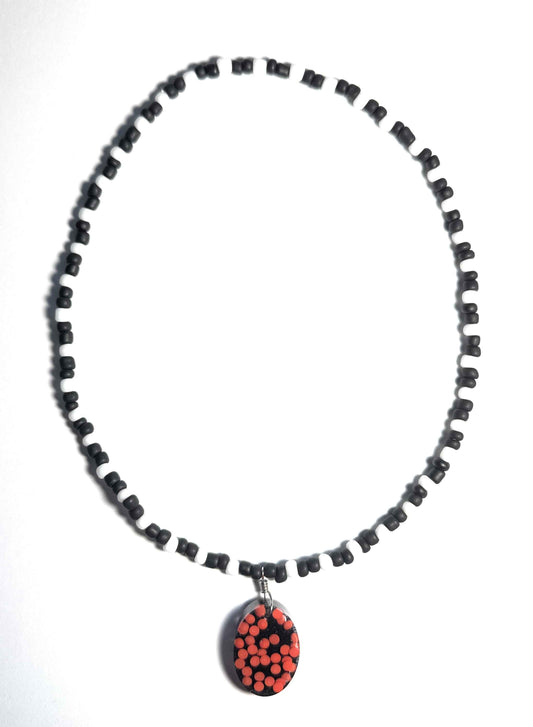 Black and White Seed Bead Stretchy Necklace with Red Dotted Resin Pendant